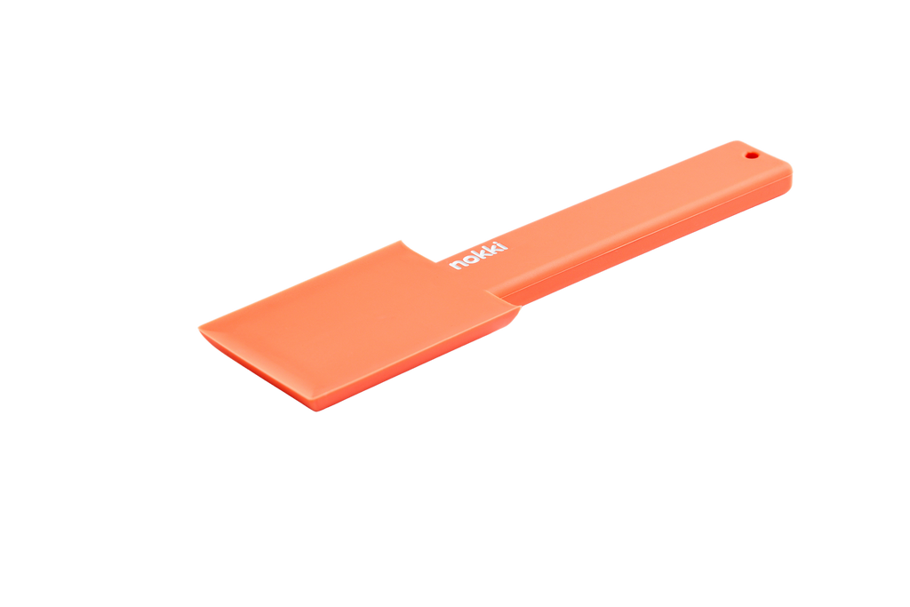 Orange Nokki scraper with ergonomic grip, ideal for home espresso enthusiasts