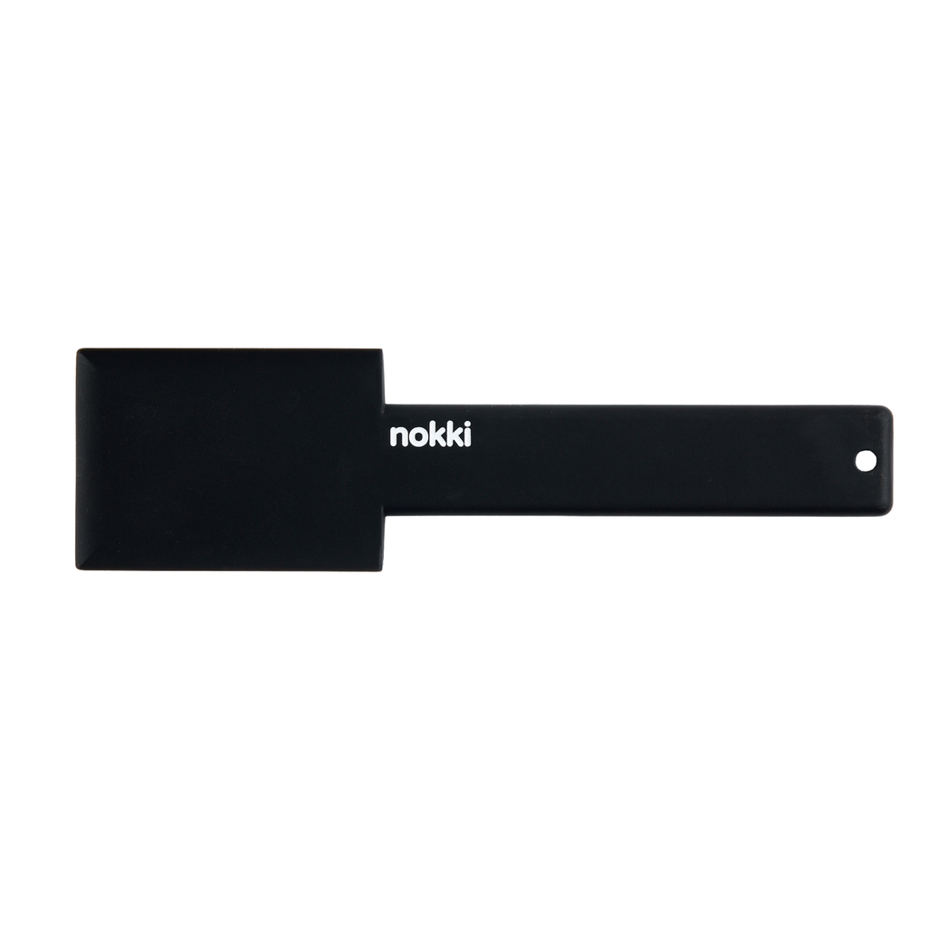black nokki portafilter scraper on white background
